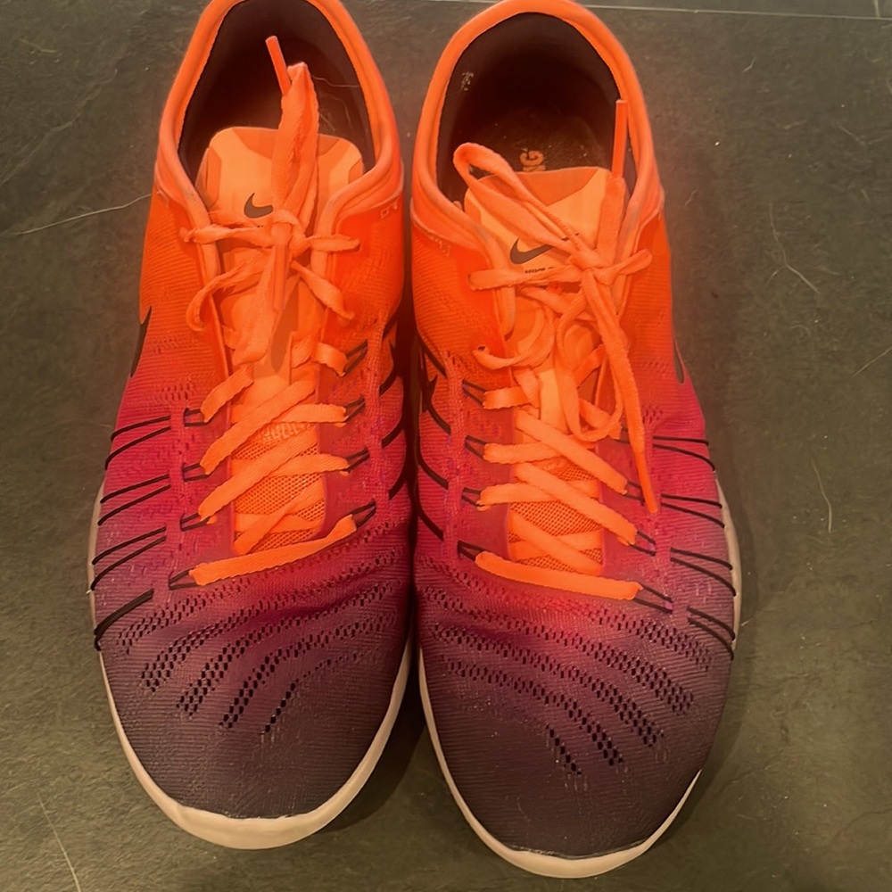 Neon Nike running /training shoes .Bright orange with ombré purple .